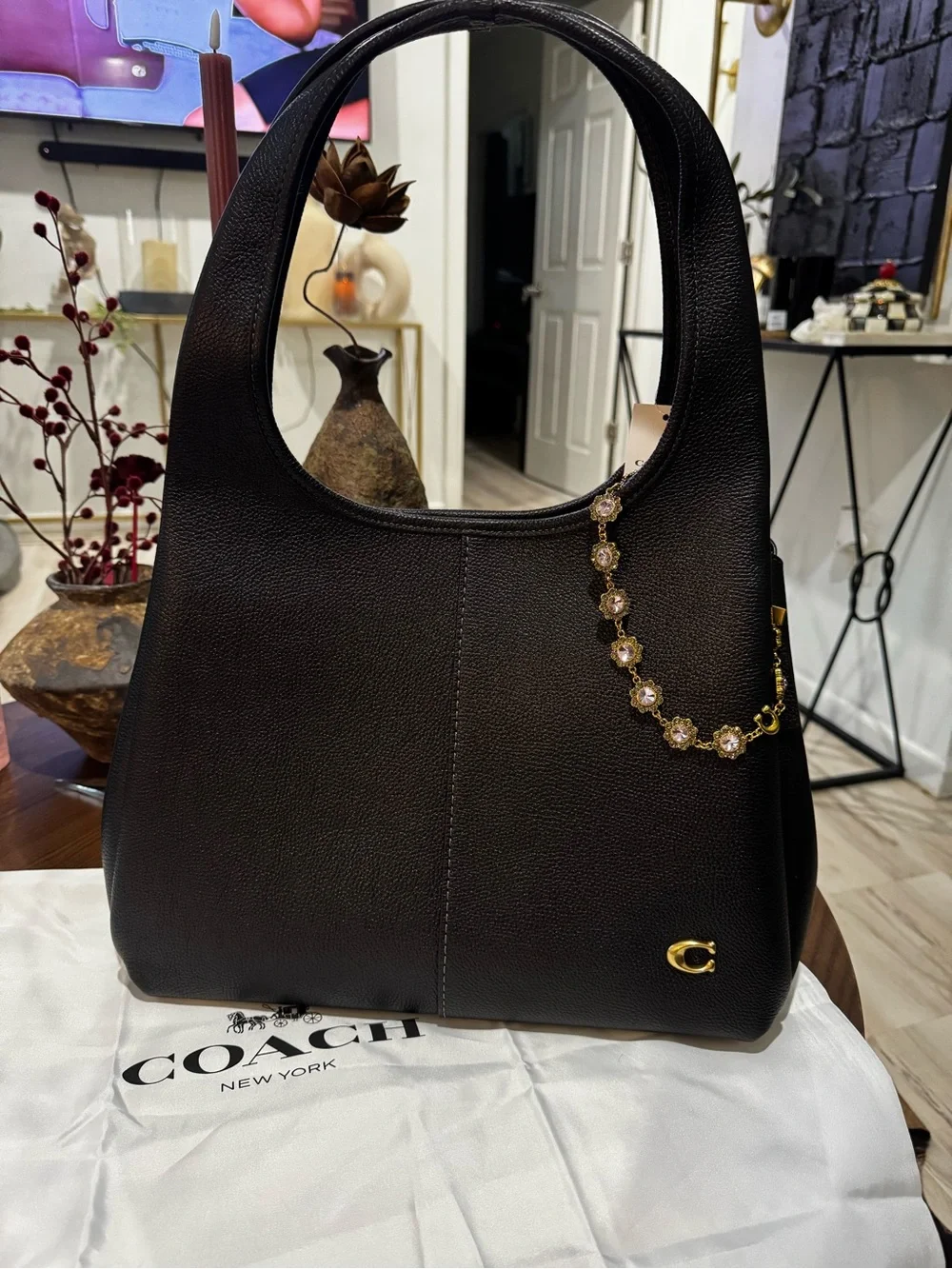 Coach Black Pebbled Leather Hobo with Gold Floral Chain Accent
